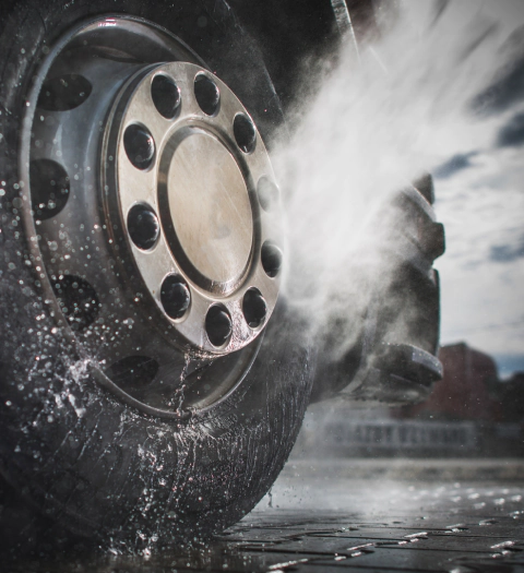 a close up view of the wheels getting washed